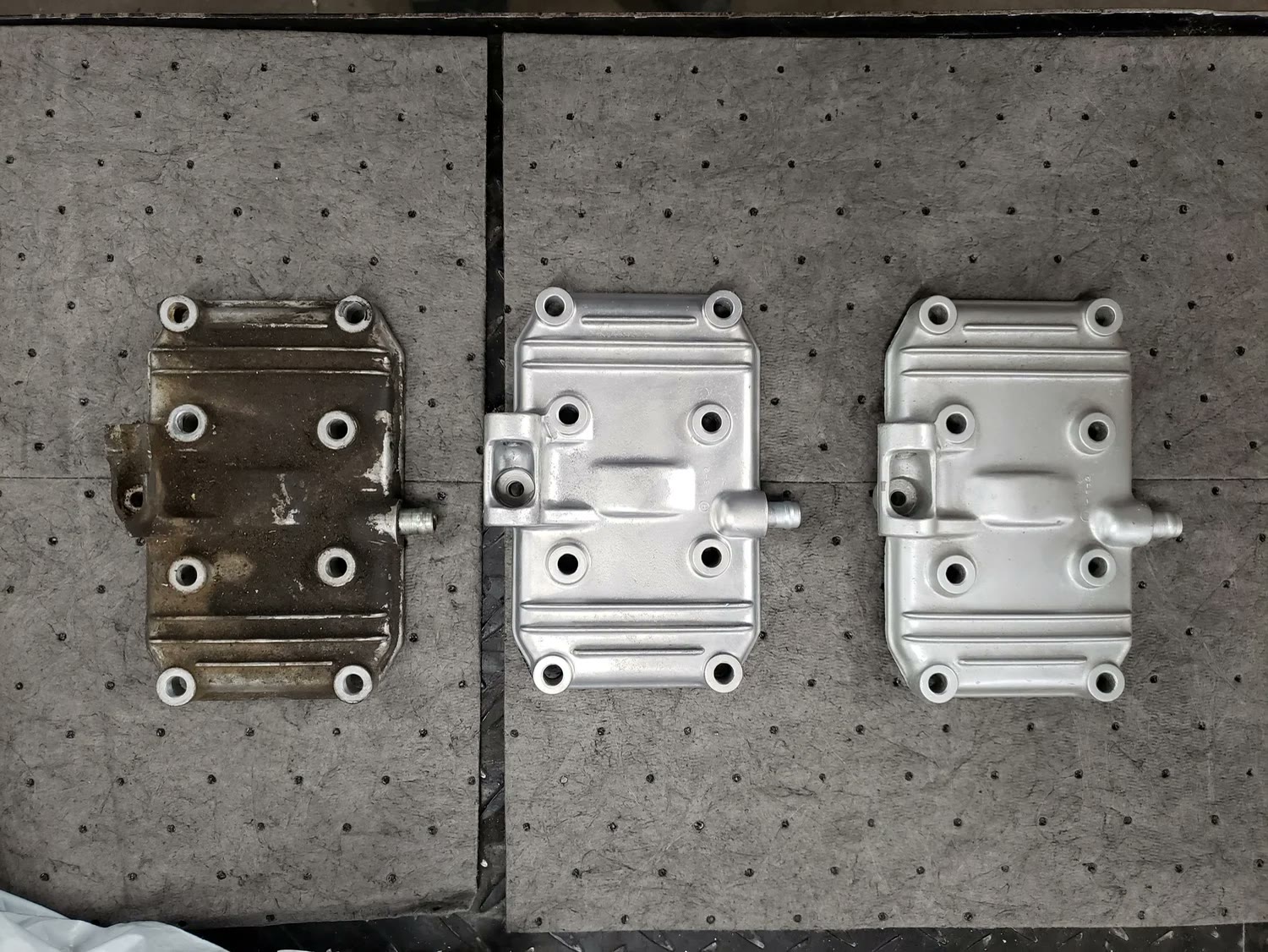 Same cover — before and after vapor blasting